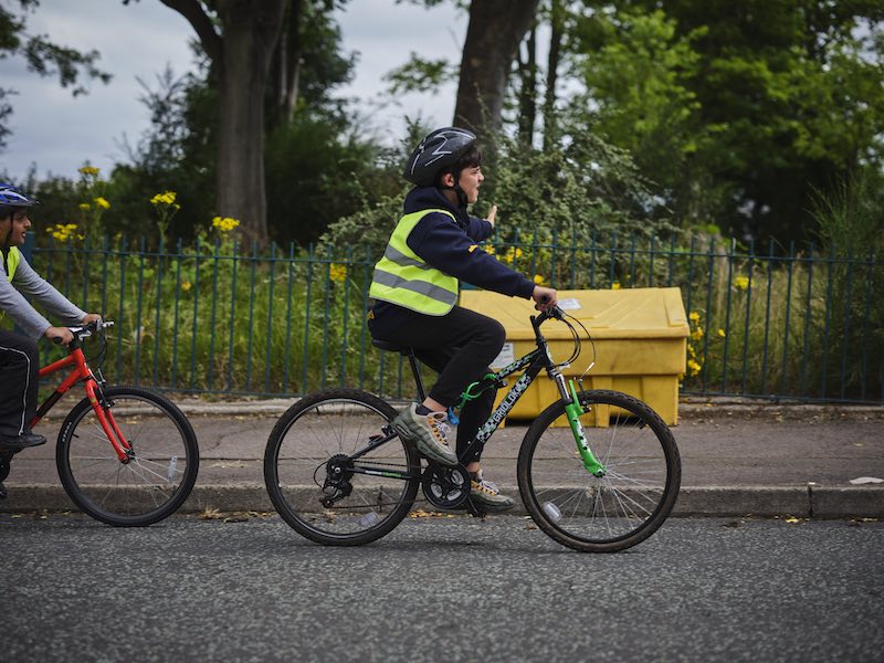 Child riding a bike.