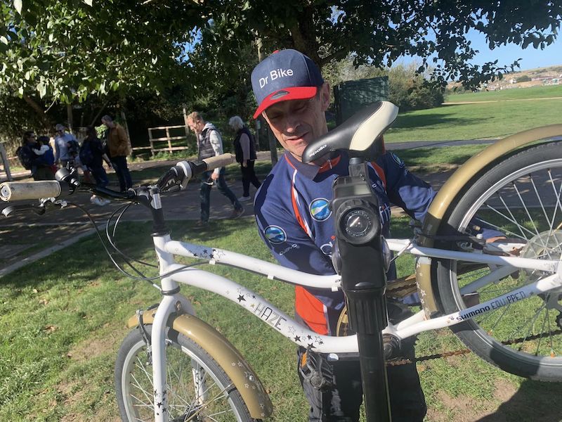 Fixing a child's bike.
